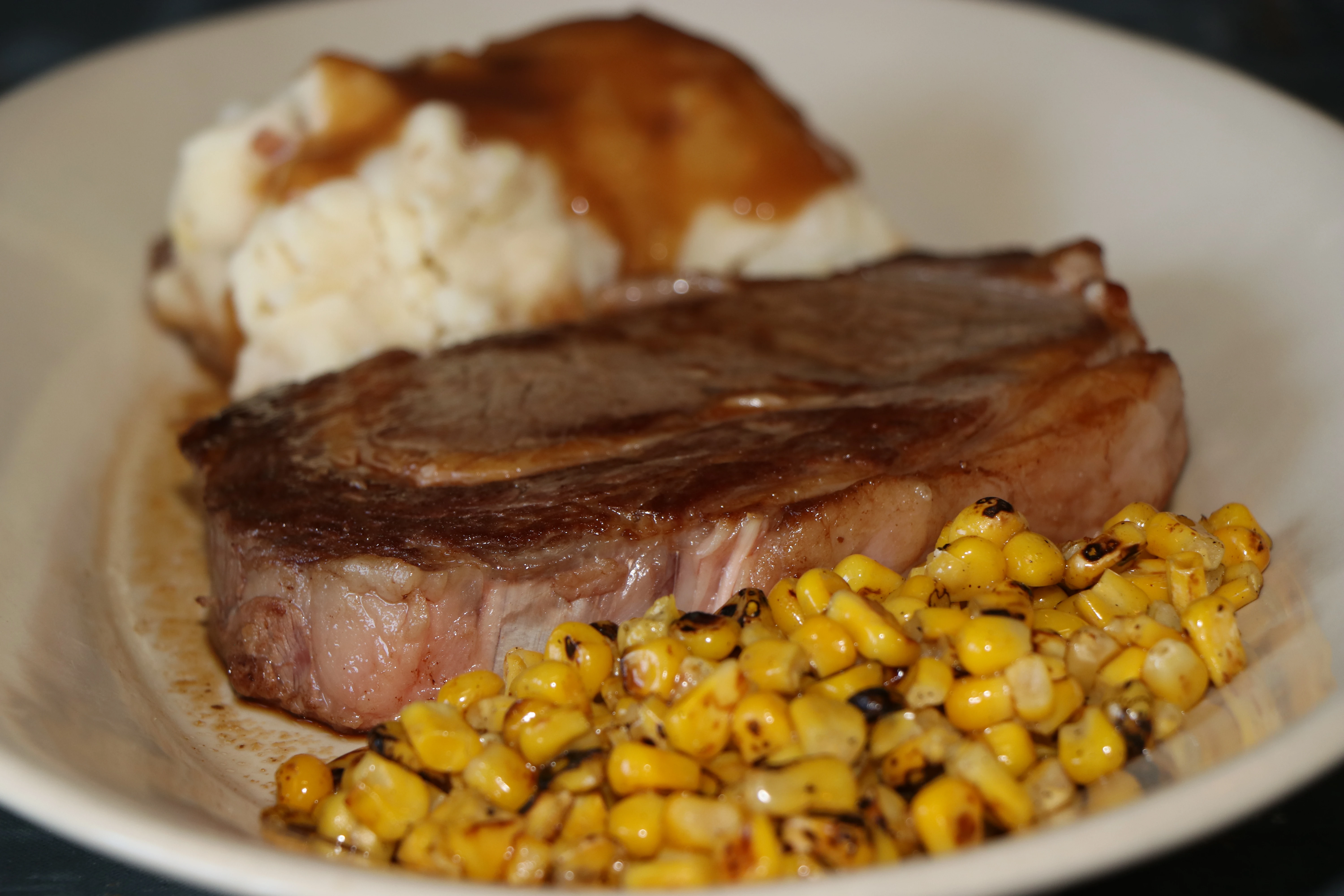 Plate with steak and mashed potatoes